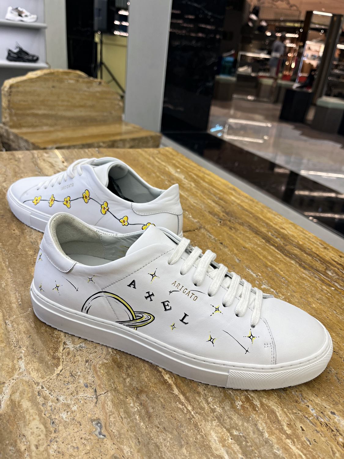 Completed artist-customised Axel Arigato shoe