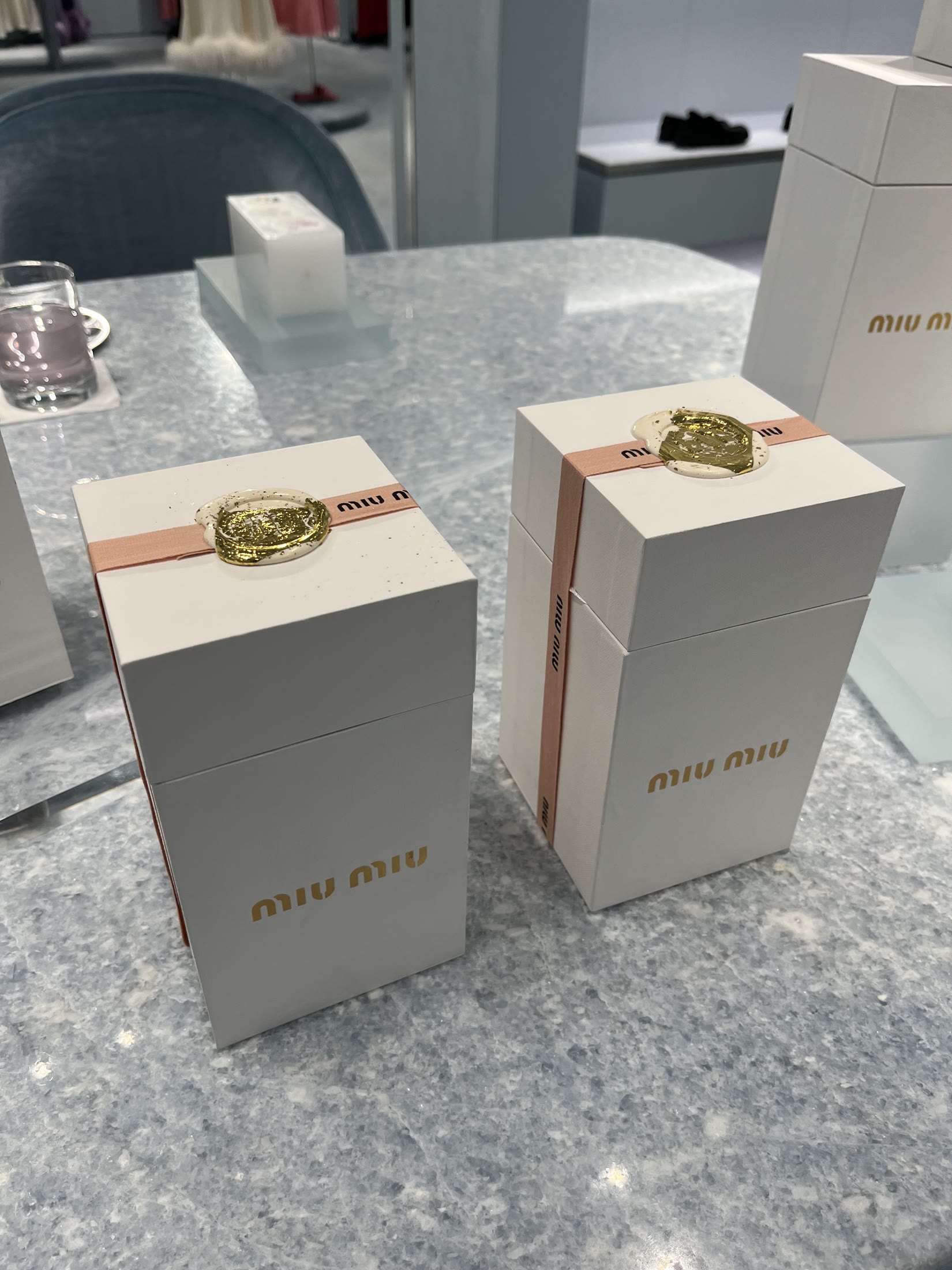 Finished Miu Miu gift boxes with wax seals