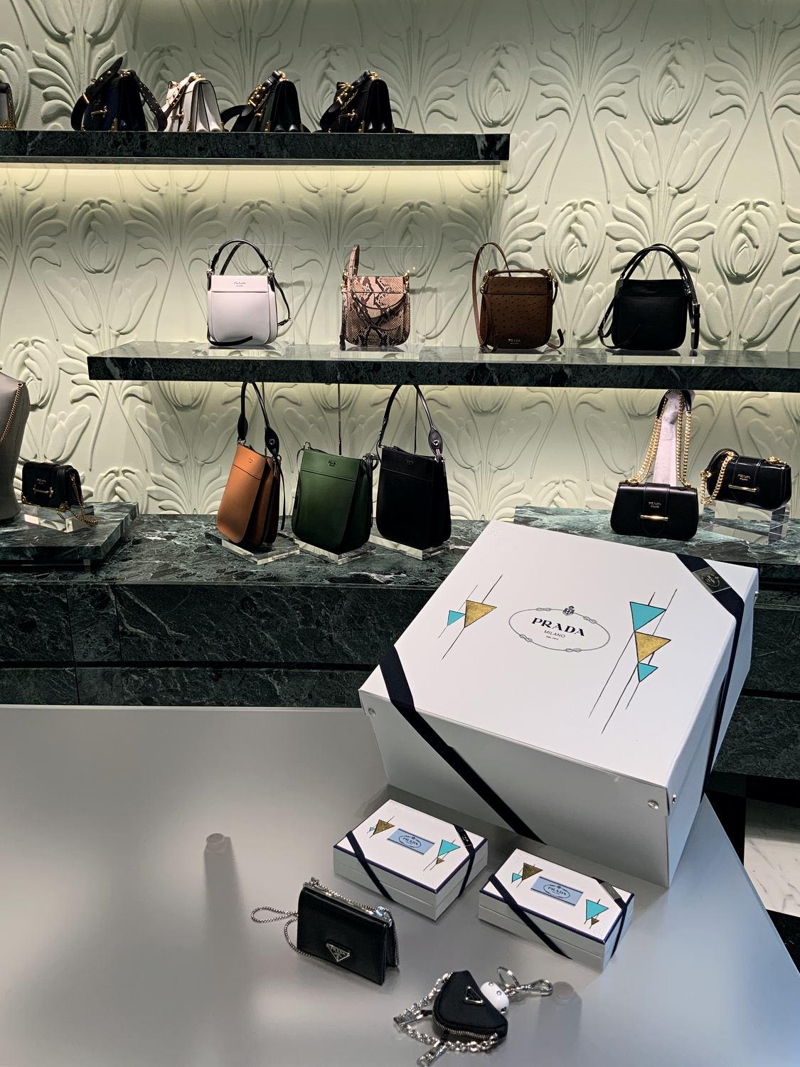 Artist delivering a live Prada in-store activation in Dubai