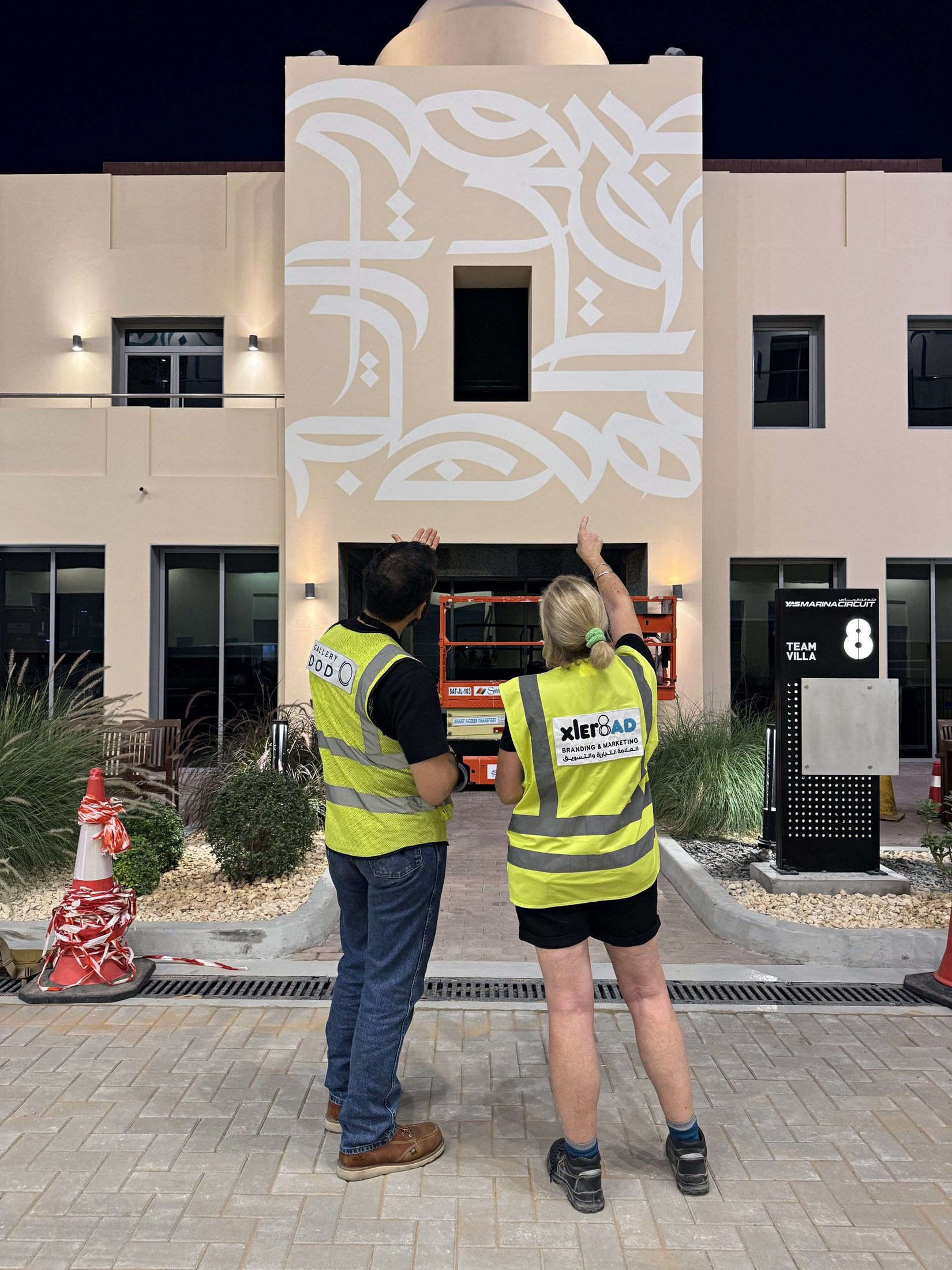 Gallery Dod and XLer8 AD reviewing a Team Villa elevation on site